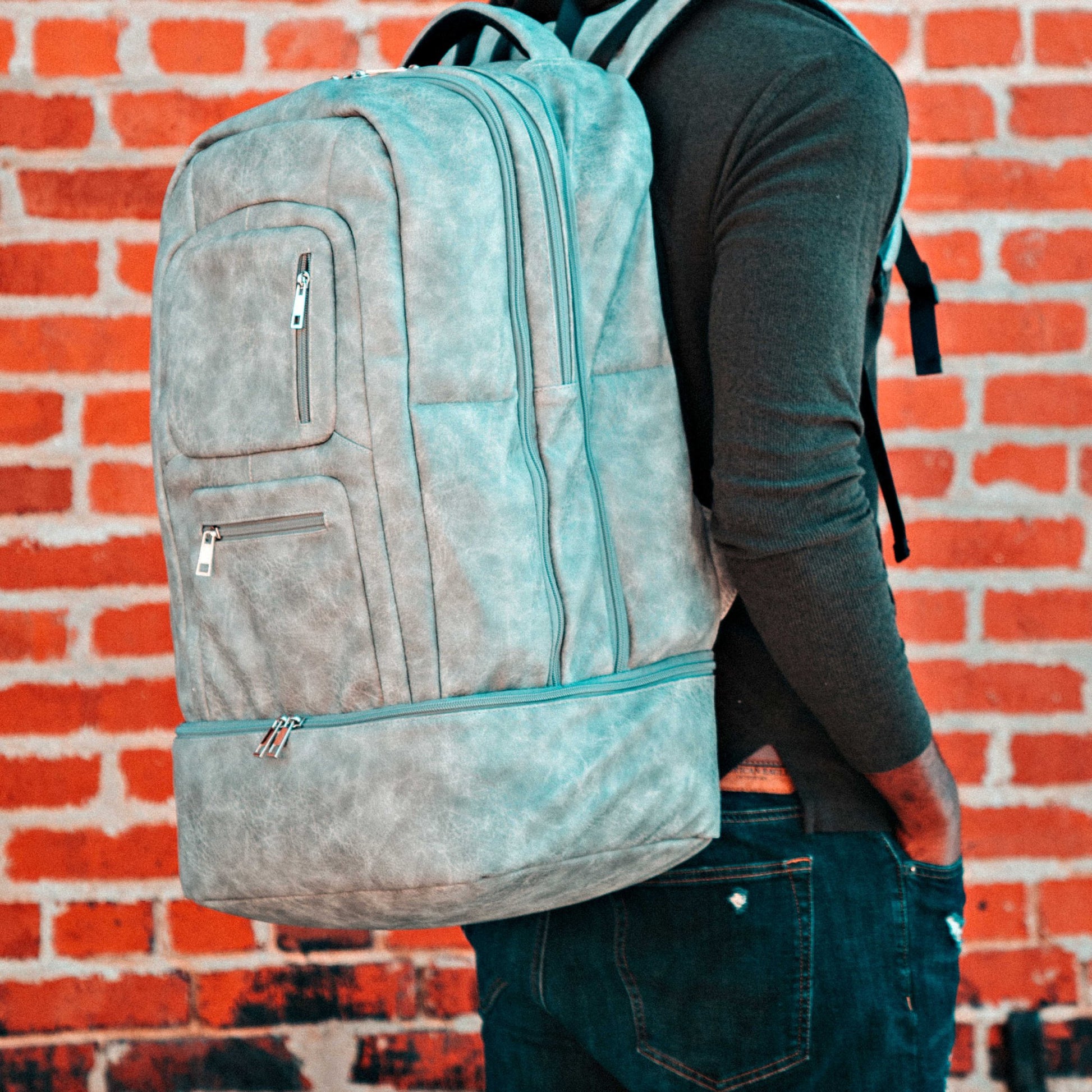 Grey Leather Carry - On Patented Backpack - Lucid Soles